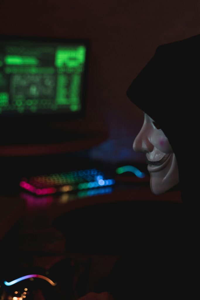 Close-Up View of a Person Wearing Guy Fawkes Mask